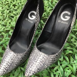 G by Guess black and white snake skin pumps.